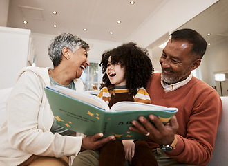 Image showing Grandparents, kid and laugh for reading, book or home for support, learning or education with love. Senior man, woman and happy child for funny story, teaching or help for development in family house