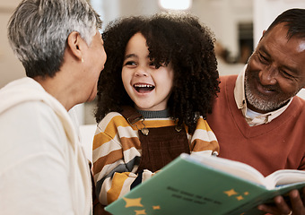 Image showing Grandparents, kid and happy for reading, book or home for support, learning or education with laugh. Senior man, woman and young child for funny story, teaching or help for development in family home