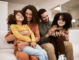 Image showing Happy parents, laugh and family child, mother and father excited, having fun and enjoy funny quality time together. Comedy humour, home and relax mom, dad or people playing with kids on lounge couch