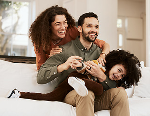 Image showing Happy parents, play and family child, mother and father laughing, care and enjoy quality time together, fun or home joke. Comedy, love and bonding mom, dad or playful people with kids on lounge sofa