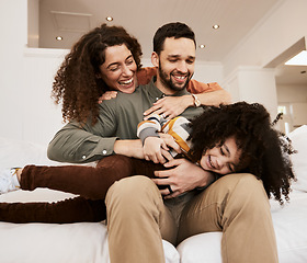 Image showing Laughing, play and home child, mother and father having. fun, care and parents tickle young kid, relax and excited on apartment sofa. Funny comedy, love and bonding mama, papa or goofy family bonding