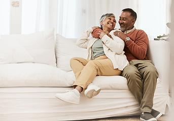 Image showing Happy, laugh and senior couple hug on sofa with conversation, care and romance in their home. Smile, embrace and elderly man with woman in living room relax, talking and enjoying retirement in house