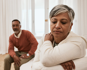 Image showing Senior, frustrated and couple in fight, conflict or argument in divorce, dispute or disagreement on sofa. Mature man and woman in toxic relationship, marriage or breakup from cheating affair at home