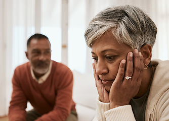 Image showing Divorce, crisis and senior couple on sofa with problem, fail or angry, argument or dispute at home. Marriage, stress and annoyed man with woman in living room for depression, abuse or cheating guilt