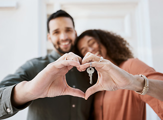 Image showing Keys, heart and hands by couple hug for real estate, success or mortgage loan in new home together. Love, emoji and man with woman smile for thank you, emoji or realtor, property or dream house sale