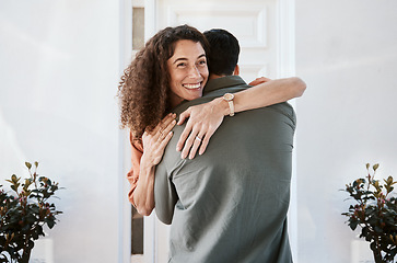 Image showing Smile, love and a couple hugging in their home for support, care or romance in marriage together. Happy, trust and security with a woman embracing her husband in their house for relationship bonding