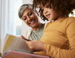 Image showing Home, happy family grandmother and child reading book, study kindergarten storybook and old woman babysitting grandchild. Love, happiness and grandma support, care and helping kid with home education