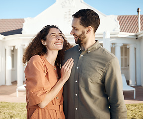 Image showing Happy, couple and hug outdoor of new house, real estate and moving to residential property for rental. Man, woman and homeowner smile in garden for investment, mortgage finance and dream neighborhood