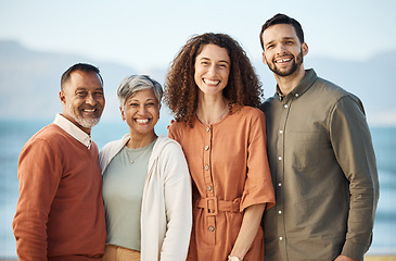 Image showing Portrait, couple and senior parents at beach on holiday, vacation or travel. Face, family men and women at ocean for connection, bonding and having fun together, smile and happy on interracial trip