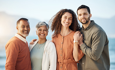 Image showing Couple, portrait and mature parents at beach on holiday, vacation or travel. Face, family men and women at ocean for interracial connection, bonding and having fun together, smile and happy at sunset