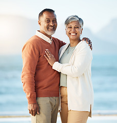 Image showing Senior couple, beach portrait and smile with hug, care and bonding for love, romance and vacation by sea. Mature man, woman and together with marriage, trust and sunshine on holiday in Indonesia