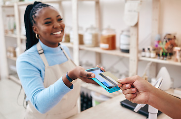 Image showing Sustainable shop, cashier and credit card tap with store, woman and electronic transaction with small business. Worker smile, entrepreneur and happy African person with retail employee and shopping