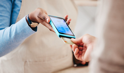 Image showing Credit card, store sale and hand with cashier, machine and transaction in a retail shop. People, ecommerce and shopping with electronic pay, fintech and customer with payment and financial tech