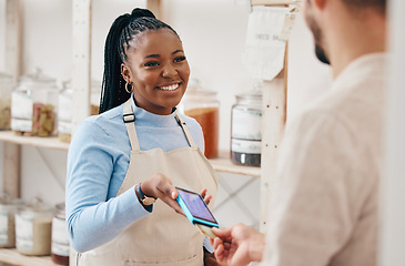 Image showing Sustainable shop, woman payment and credit card with store and electronic transaction with small business. Worker smile, entrepreneur and happy African person with retail employee and shopping pay