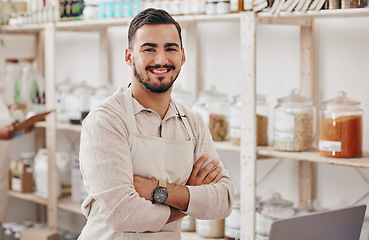 Image showing Supermarket, grocery store and portrait of man with crossed arms for service in organic startup. Small business, sustainable shop and manager smile for groceries, vegan products and natural food