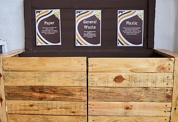 Image showing Sign, recycling and sustainability with a wooden box for paper, plastic or general waste disposal. Environment, green and nature conservation with a crate for an eco friendly campaign on earth day