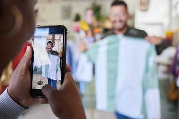 Image showing Fashion, phone and man taking a picture for shopping in a retail store for social media influencer. Style, cellphone and male content creator posing with clothes for an outfit for brand ambassador.