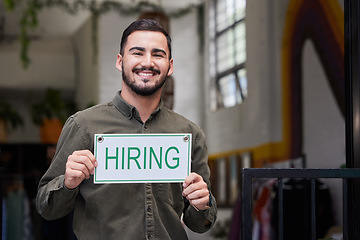 Image showing Portrait, man and we are hiring opportunity sign with recruiting, happy and smile from business owner. Male person, store and entrepreneur with recruitment poster and job search signage with manager