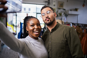 Image showing Couple, bond and selfie of people in clothing store for profile picture, social media and blog on internet. Diversity, man and happy black woman take photo in shop for connection and fun memory