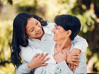 Image showing Daughter, mature woman and hug in garden with love on mothers day or women bonding with care for mom in retirement. Happy, family and embrace in outdoor, backyard or together on holiday or vacation