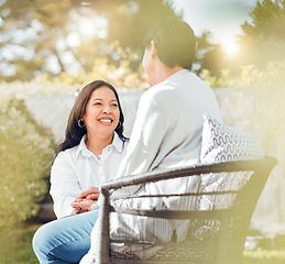 Image showing Woman, mature mother or talking in garden on mothers day or women bonding for support or love. Holding hands, retirement or mom with a happy daughter in outdoor backyard together on holiday vacation