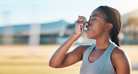 Image showing Fitness, breathe and black woman with asthma, inhaler or pump at sports court for training with lung problem. Exercise, deep breath and lady runner with medical relief from allergy respiratory issue