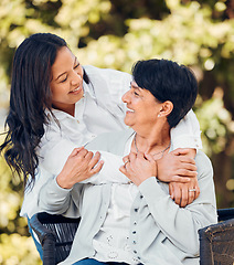 Image showing Woman, mature mother and hug in garden with love on mothers day or women bonding with care for mom in retirement. Happy, family and embrace in outdoor, backyard or together on holiday or vacation