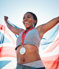 Image showing Fitness, winning and black woman with achievement, UK flag and sports with competition, victory and champion. African person, athlete or winner with British symbol, pride and medal with celebration