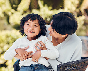 Image showing Boy, hug and mature woman in park for bonding, support and summer break in Mexico nature. Kid, happy or excited child with grandmother on garden bench for love, trust and together in backyard embrace