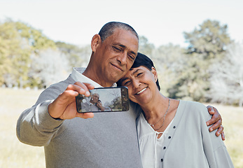 Image showing Hug, selfie or old couple in park with love, smile or support with romance, bonding or marriage together. Photograph, old man or elderly woman taking pictures in retirement with happiness together