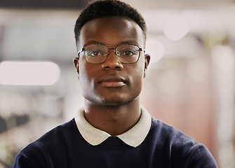 Image showing Student, university and portrait of black man on campus for learning, education and vision for future career. Face of African person in library with glasses for research, school project and studying