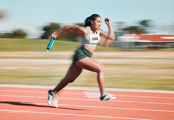 Image showing Fast, race and athlete running relay sprint in competition or fitness game or training for energy wellness on a track. Sports, stadium and athletic person or runner exercise, speed and workout