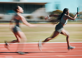 Image showing Action, race and women running relay sprint in competition for fitness game and training, energy or wellness on a track. Sports, stadium and athletic people or runner exercise, speed and workout