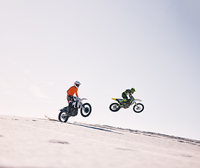 Image showing Sports, jump and people on motorcycle driving on sand, beach or training for a challenge, competition or desert rally mockup. Dirt, motorbike and fearless extreme stunt or jumping in space or air