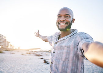 Image showing Selfie, beach and man with a smile for travel, social media and profile picture with freedom. Sea, African male person and portrait with photo with vacation and holiday influencer post on Miami trip