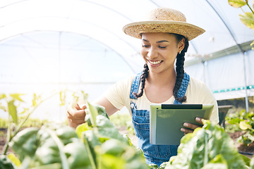 Image showing Farmer, woman and tablet for greenhouse plants, growth inspection and vegetables development in agriculture. Young worker farming, quality assurance and digital tech for food or gardening progress