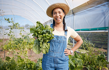 Image showing Farming, agriculture and woman with vegetables in a greenhouse for health and sustainability. Portrait of a young farmer with spinach for eco lifestyle, agro startup or organic food for wellness
