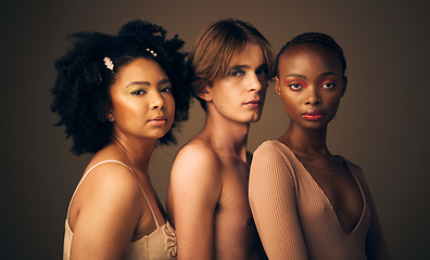 Image showing Portrait, beauty or skincare with a man and women in studio on a dark background for makeup or cosmetics. Face, friends and diversity with confident young people posing for inclusion or freedom