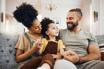 Image showing Smile, bonding and interracial family on the sofa for conversation, love and talking. Happy, house and a mother, father and a boy child on the couch for comfort, care and together for communication