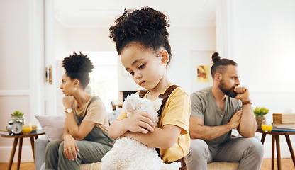 Image showing Divorce, custody and sad boy child with teddy bear in living room for stress, support and comfort at home. Family, crisis and kid with anxiety for toxic parents, argue or dispute, depression or fear