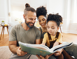 Image showing Interracial parents, kid and reading with book, story and learning with care, love and teaching on floor. Father, mother and child with education, knowledge or language for development in family home