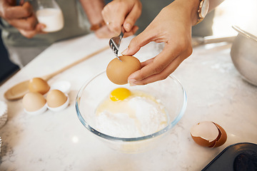 Image showing Hands with fork, crack egg and cooking in kitchen on bowl on table in home. Food, bakery and break eggshell for ingredient in flour for healthy diet, protein nutrition or person in pastry preparation