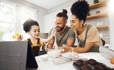 Image showing Interracial parents, kid and cooking in kitchen, learning or muffins with tablet, support or helping hand. Mother, father and child with bowl, teaching and baking with flour, cupcakes and family home