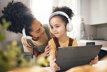 Image showing Mother, child and tablet with headphones, home or happy for movie, music or streaming subscription. Mom, kid and digital touchscreen for education, learning or online course with help in family house