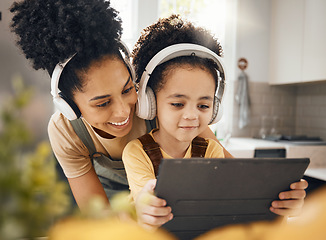 Image showing Mother, child and tablet with headphones, smile or excited for movie, music or streaming subscription. Mom, kid and digital touchscreen for education, learning or help for online class in family home