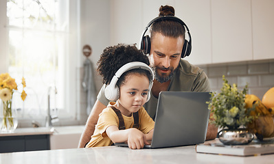 Image showing Father, child and laptop with headphones, home or happy for movie, music or streaming subscription. Dad, kid and computer for education, learning or help for online course in interracial family house
