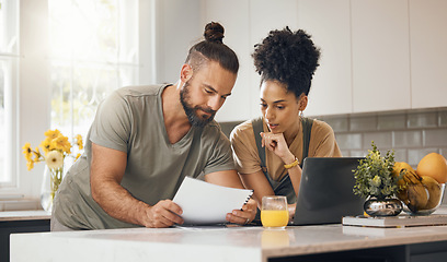 Image showing Interracial couple, laptop in kitchen and insurance paperwork, budget and finance with life and marriage. Partner, people at home and reading document with policy, taxes and bills with mortgage