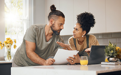 Image showing Debt, documents and couple in kitchen with laptop argue for financial bills, online payment and banking. Marriage, stress and man and woman on computer with mortgage, insurance paperwork and budget