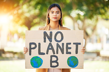 Image showing Woman, poster and save planet sign at park for climate change, environment and green eco friendly protest. Young person in portrait and nature, earth or globe support for sustainable world and action