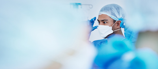 Image showing Surgeon, face mask and hospital doctor in ICU for healthcare, medical and clinic work. Prepare, surgery and working in operating room with hygiene and safety protection for wellness with mockup space